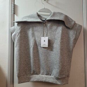 Sleeveless zip collar top